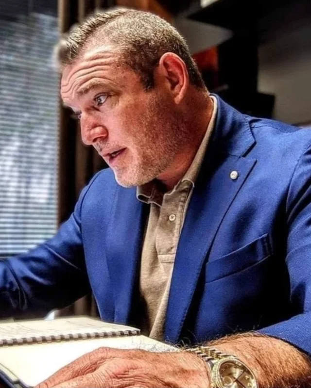 John, owner-operator of JM Data LLC, working at his desk